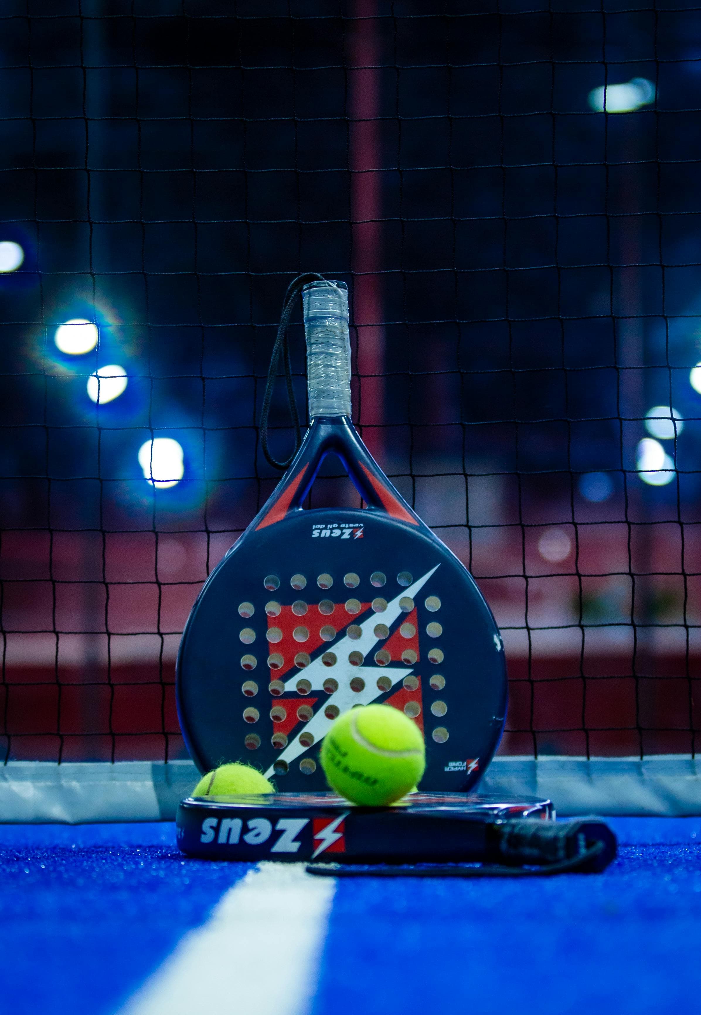 Behind the baseline.